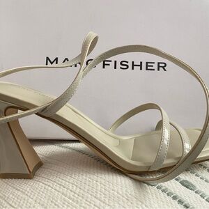 Never worn Marc Fisher strapped very light grey Mahima heels.